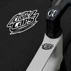 Shred MTB Sticker by Crank Caps on a bike